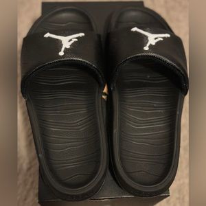 Gently worn Youth Jordan slides.